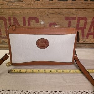 Dooney & Bourke White Pebbled Leather with Tan Trim